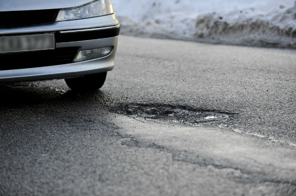 Our car accident lawyers discuss how to report dangerous road conditions in Oklahoma City.